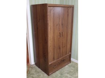 Armoire With Clothes Rack 33W X 24D X 63H (Item Upstairs, Bring Help To Remove)