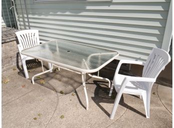 Outdoor Glass Table And Plastic Chairs Lot
