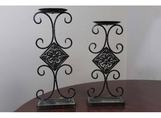 Two Wrought Candle Holders