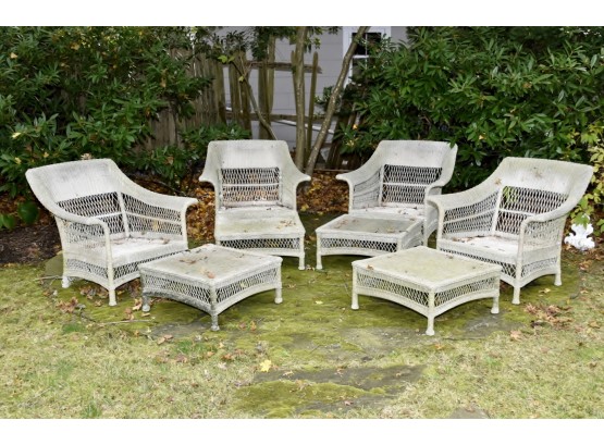 Four Outdoor Wicker Oversized Chairs With Ottomans
