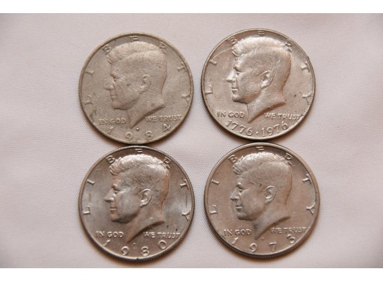 Four Vintage Kennedy Half Dollar Coins