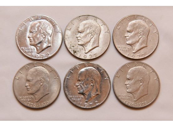 Six Vintage Eisenhower Dollar Coins