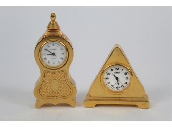 Two Miniature Gold Clocks