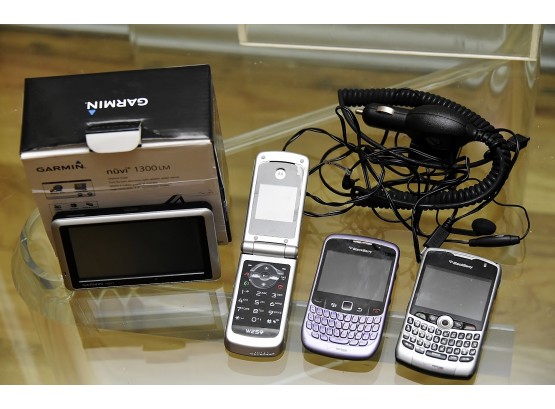 Collection Of Vintage Cell Phones And GPS