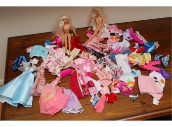 Barbies And Assorted Clothing And Accessories