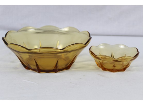 Two Amber Glass Bowls