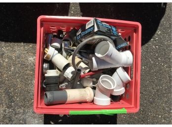 PLASTIC CRATE OF SOME PLUMBING SUPPLIES
