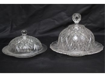 Two Covered Glass Dishes