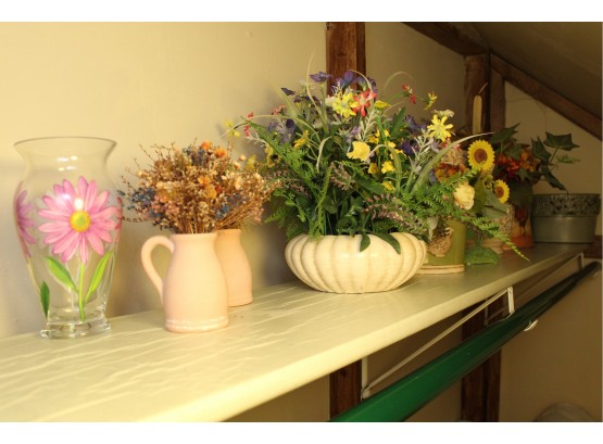 Shelf Full Of Silk Flowers And Vases