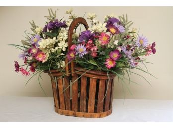 Faux Flowers In Wooden Basket
