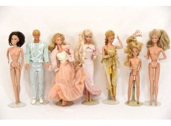 Lot Of 7 Barbie Dolls - #60