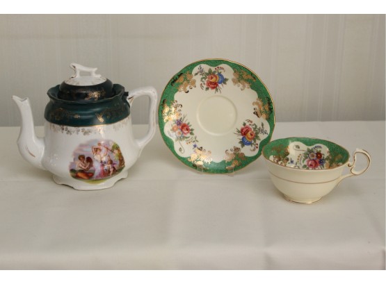Porcelain Tea Pot And Tea Cup And Saucer