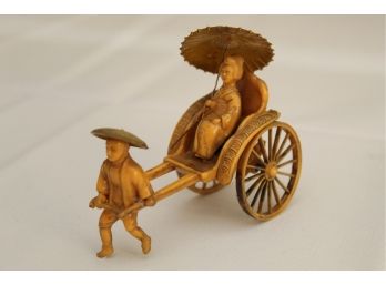 Bakelite Rickshaw Figurine With Geisha