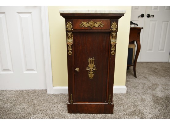 Antique Empire Single Door Commode With Marble Top, Tapered Pilaster, Bust Termini And Ormolu Mounting