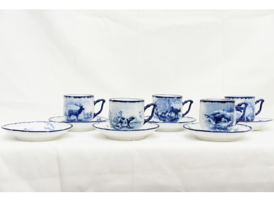 Set Of Blue Flow Cups And Saucers