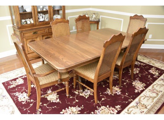 Dual Pedestal Oak Dining Table With Matching Cane Back Dining Chairs