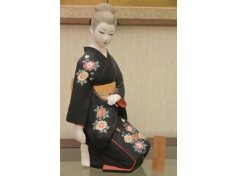 Geisha With Wooden Sign