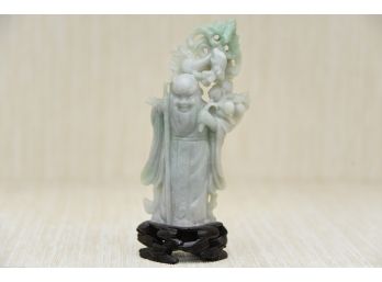Carved Asian Jade On Rosewood Stand