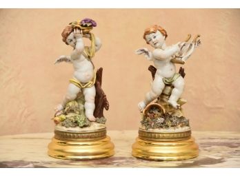 Pair Of  Italian Porcelain Algora Cherub Figurings On Gold Bases