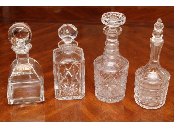 Collection Of Four Crystal Decanters With Stoppers