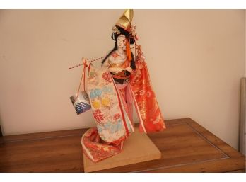Asian Figurine On Stand 11 Inches Tall