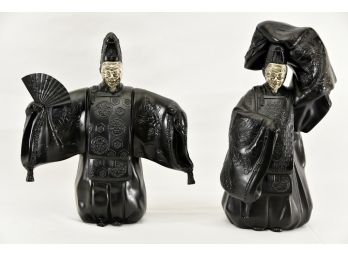 Two Cast Metal Masked Asian Emperor Figures