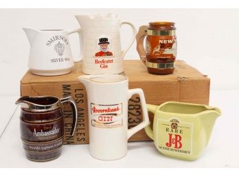 Group Of Steins Including Beefeater And Smirnoff