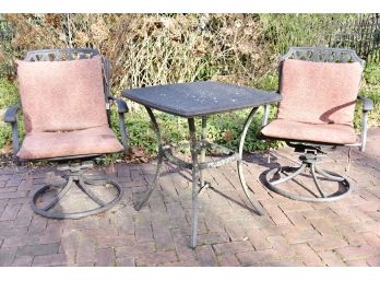 Black Cast Metal Seating Area Including Table And Chairs