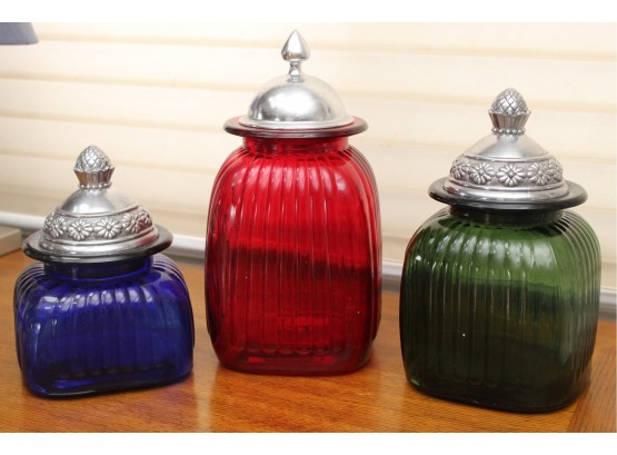 Trio Of Colored Glass Canisters