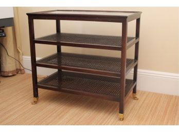 A Mid Century Three Tier Rolling Cart With Cane Shelving