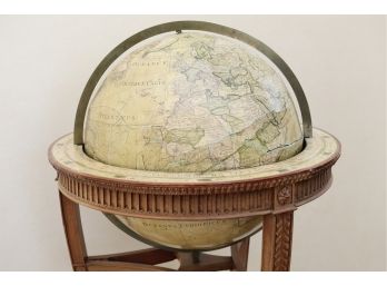 An Antique Globe On Stand