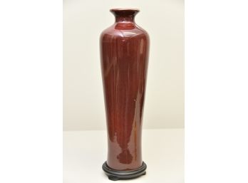 Red Ceramic Glazed Vase With Black Footed Base