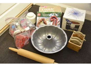 Collection Of Baking Supplies Including Cookie Cutters, Rolling Pin, And Danescook Salsa Dip Cup