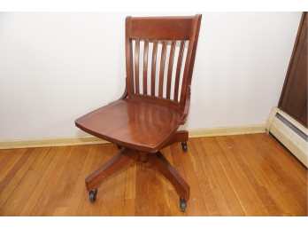 A Williams-sonoma Maple Bankers Chair