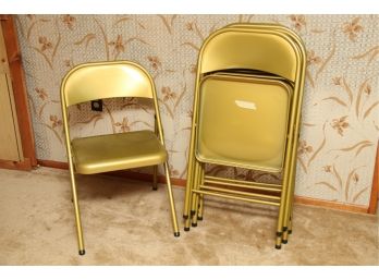 A Set Of 5 Metal Folding Chairs