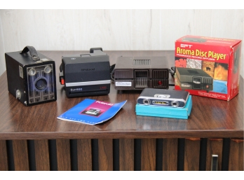 Assortment Of Vintage Cameras & Fragrance Record Player