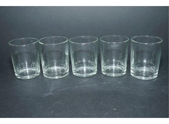 A Group Of 5 Shot Glasses