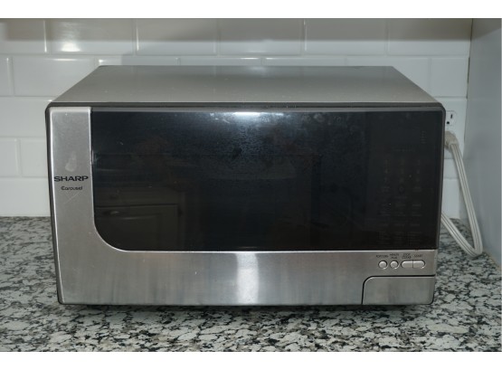 Sharp R-315JS 1-1/5-Cubic-Foot 1200-Watt Microwave Oven, Stainless (tested And Working)