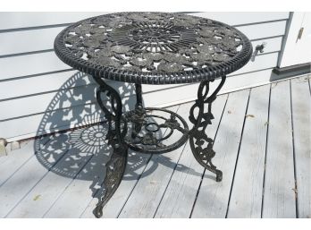 A Berkeley Forge Vintage Cast Iron Circular Rose Outdoor Garden Table