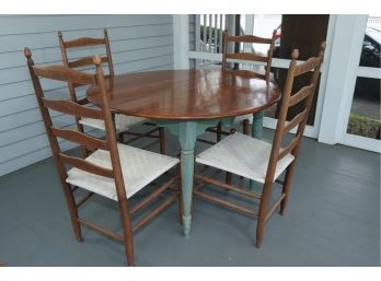 Distressed Wooden Expandable Breakfast Table With Leaf And Set Of 4 Distressed Wooden Chairs With Woven Cloth