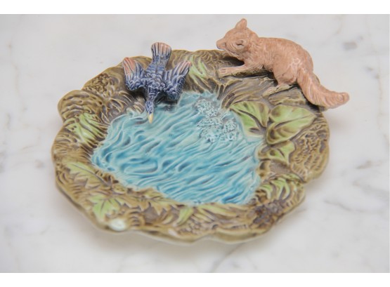 A Majolica Dish Depicting On The Prowl
