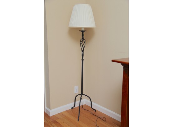 A Black Wrought Iron Twist Floor Lamp With Shade