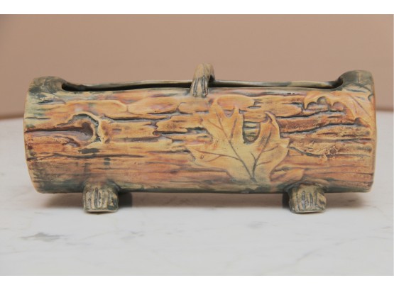 A Weller Ceramic Log Display With Fall Leaf