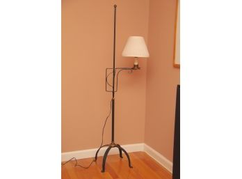 A Black Wrought Iron Floor Lamp 60 Inches Tall