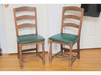 A Pair Of Solid Oak Side Chair With Green Vinyl Seats