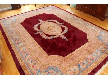 An Antique Oriental Carpet In Red And White