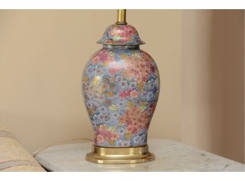 A Colorful Table Lamp With Brass Base