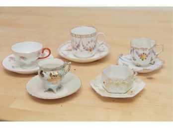 A Collection Of Porcelain Tea Cups