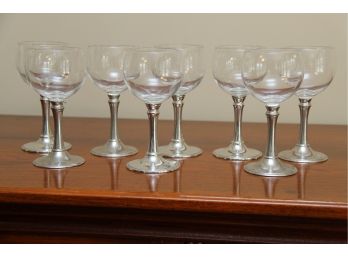 A Set Of Pewter Stem White Wine Glasses