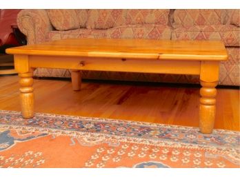 A Large Knotty Pine Coffee Table By Lancaster Furniture Company